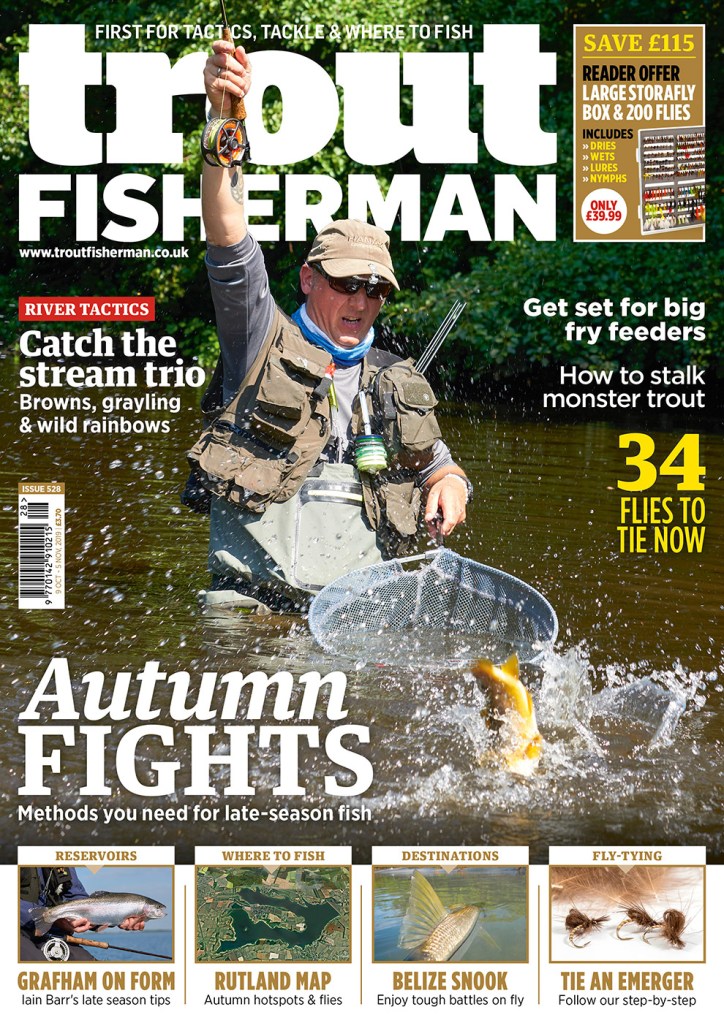 Magazine cover design for 'Trout Fisherman' picturing an angler catching a trout in a net