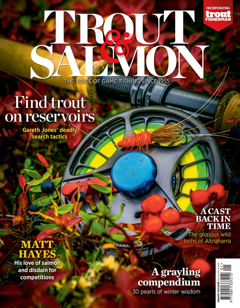 Magazine cover design for 'Trout & Salmon' picturing a close-up of a fly fishing rod and reel sat in foliage